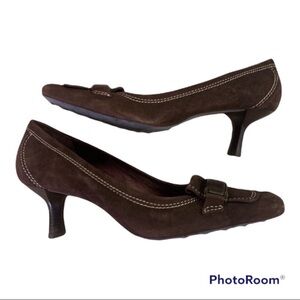 Cole Haan brown suede kitten heels with white stitching and buckle